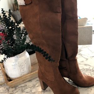 Over-the-knee brown suede boots with heels